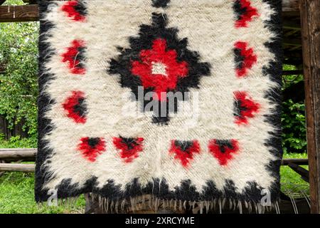 A traditional romanian wool rug background macro. Stock Photo