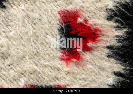 A traditional romanian wool rug background macro. Stock Photo