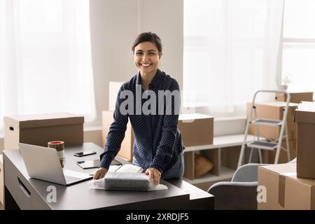 Portrait of small business owner prepare goods for dispatch Stock Photo