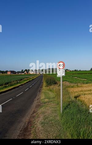 The B9127 Road out of Arbroath towards Arbilot Village with a sign indicating a 40 mph speed limit and a Walking and Cycling Friendly road. Stock Photo