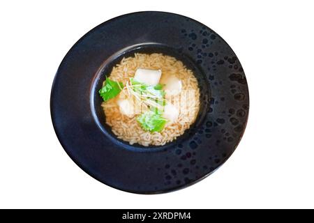 Die cut of Rice Soup with Fish on black bowl on white isolated Stock Photo
