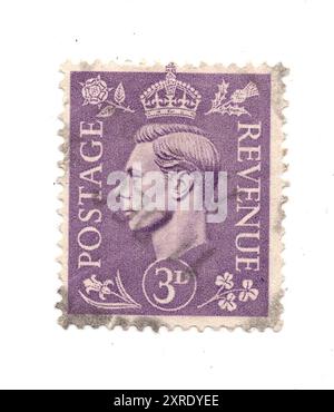 A vintage king George VI postage stamp from Great Britain on a white background. Stock Photo