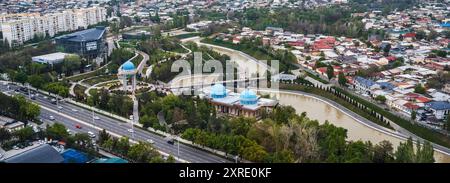 Aerial top view of Museum of Victims of Political Repression and the Patriot Memorial from observation deck in Tashkent city. Tashkent, Uzbekistan - April 16, 2024 Stock Photo