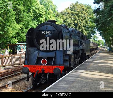 Vintage British Railways BR Standard Class 9F 2-10-0  steam locomotive  'Black Prince' at station. Stock Photo