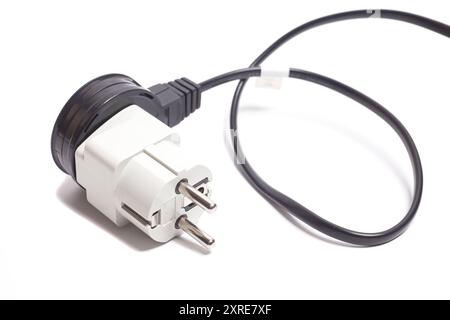 Power cable with universal white plug adapter isolated on white Stock Photo