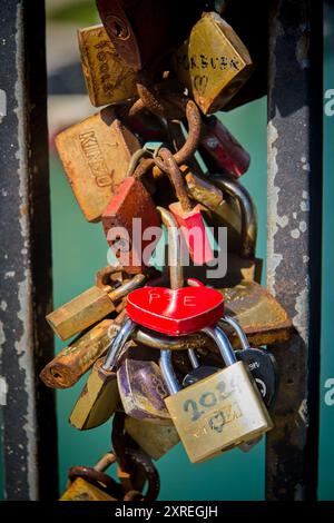 Love lock or love padlock is a padlock that couples lock to symbolize their love and let it last forever Stock Photo