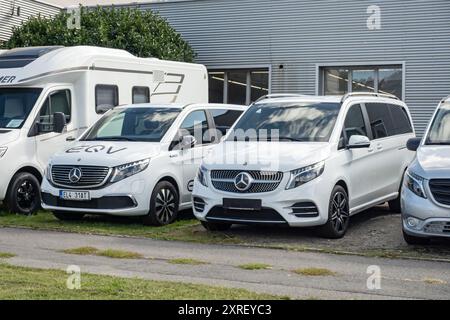 OSTRAVA, CZECH REPUBLIC - SEPTEMBER 21, 2023: Mercedes-Bencz V-Class and electric EQV minivan car at dealership Stock Photo