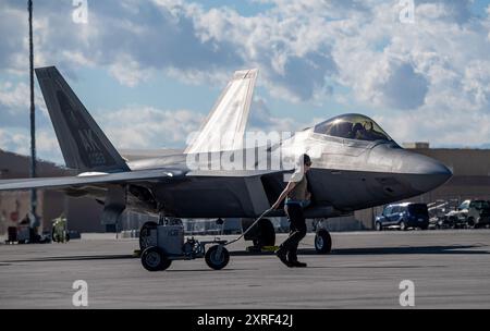 A U.S. Air Force Airman assigned to the 525th Expeditionary Fighter Generation Squadron, Joint Base Elmendorf-Richardson, Alaska, concludes maintenanc Stock Photo