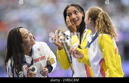 Great Britain's Katarina Johnson-Thompson, winner of the silver medal, Belgian Nafissatou Nafi Thiam, winner of the gold medal and Belgian athlete Noor Vidts, winner of the bronze medal pictured on the podium during the medal ceremony of the women's heptathlon at the athletics competition at the Paris 2024 Olympic Games, on Saturday 10 August 2024 in Paris, France. The Games of the XXXIII Olympiad are taking place in Paris from 26 July to 11 August. The Belgian delegation counts 165 athletes competing in 21 sports. BELGA PHOTO JASPER JACOBS Stock Photo