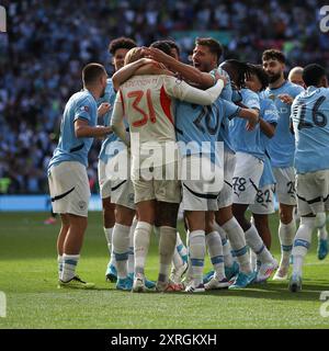 London, UK. 10th Aug, 2024. Manchester City celebrate winning the penalty shoot-out during the FA Community Shield match between Manchester United and Manchester City at Wembley Stadium, London, England on 10 August 2024. Photo by Ken Sparks. Editorial use only, license required for commercial use. No use in betting, games or a single club/league/player publications. Credit: UK Sports Pics Ltd/Alamy Live News Stock Photo