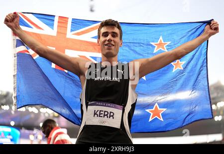 New Zealand's Hamish Kerr celebrates winning gold in the Men's High Jump Final at the Stade de France on the fifteenth day of the 2024 Paris Olympic Games in France. Picture date: Saturday August 10, 2024. Stock Photo