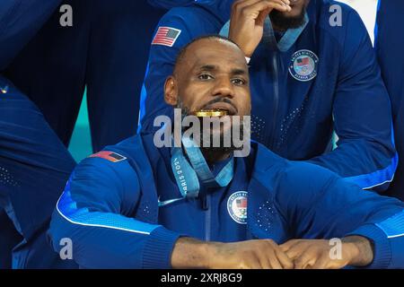 Lebron James of the USA (6) poses on the podium after team USA defeated ...
