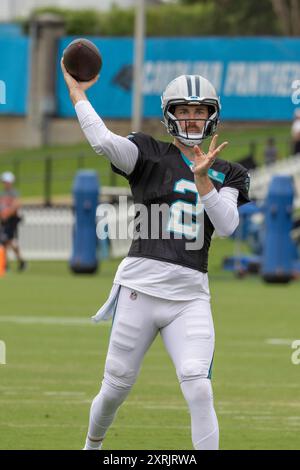 Charlotte, NC: Carolina Panthers quarterback, Jake Luton (2) drops back to pass during minicamp at Bank of America Stadium on Tuesday, August 6, 2024. Stock Photo