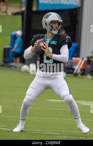 Charlotte, NC: Carolina Panthers quarterback, Jake Luton (2) drops back to pass during minicamp at Bank of America Stadium on Tuesday, August 6, 2024. Stock Photo