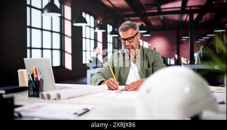 Civil Engineer Drawing Architecture Plan And Construction Design Stock Photo