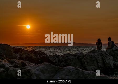 Sunset in Croatia in love on the sea shore Trpanj Croatia Stock Photo