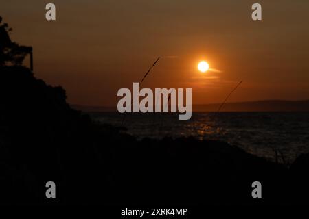 Sunset in Croatia in love on the sea shore Trpanj Croatia Stock Photo
