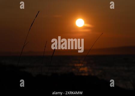 Sunset in Croatia in love on the sea shore Trpanj Croatia Stock Photo