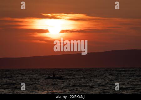 Sunset in Croatia in love on the sea shore Trpanj Croatia Stock Photo