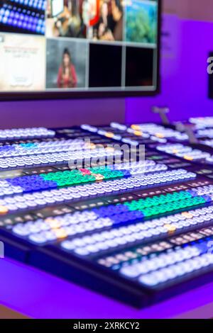 Video Mixer Switcher. Modern Live television broadcast video switcher production. Professional video and sound mixer control panel with buttons and sliders. Video switcher of Television Broadcast Stock Photo