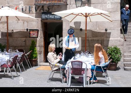 Tourists at typical restaurant. Madrid, Spain. Stock Photo