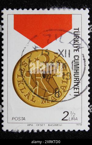 ISTANBUL, TURKEY - DECEMBER 25, 2020: Turkish stamp shows Independence Medal circa 1978 Stock Photo