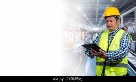 Engineer working and control robotic with industry factory and network connection automation robot arm by tablet. Automation manufacturing process con Stock Photo