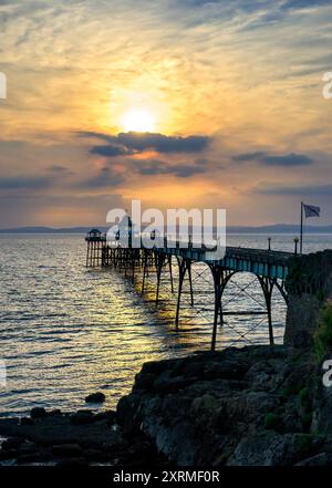 The iconic Clevedon Pier, taken in the Golden hour at sunset, with dramatic sky.  Taken at Clevedeon, Somerset, UK Stock Photo