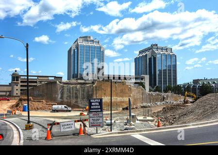 Halifax, Canada - July 22, 2024: Construction underway on the Cogswell District Redevelopment Project in downtown Halifax. The towers of Purdy’s Wharf Stock Photo