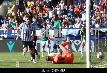 Sheffield Wednesday’s Josh Windass scores their side's third goal of the game during the Sky Bet Championship match at Hillsborough Stadium, Sheffield. Picture date: Sunday August 11, 2024. Stock Photo