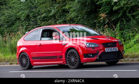 Potterspury,Northants,UK - Aug 11th 2024: 2005 red Ford Focus car on a British road Stock Photo