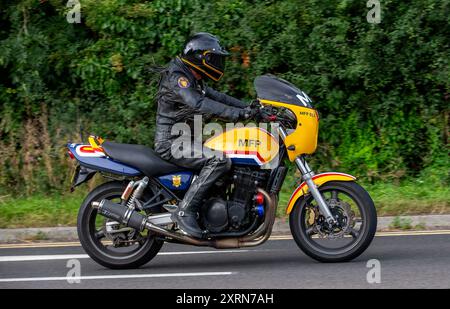 Potterspury,Northants,UK - Aug 11th 2024: 1999 Suzuki GSX750  motorcycle travelling on a British road Stock Photo