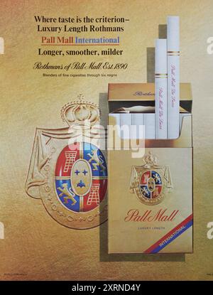 1969 vintage advertisement showcases Pall Mall International cigarettes with a regal emblem. Stock Photo