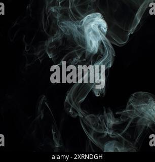 Abstract white smoke texture moves on black background. Plume of smoke wave design wallpaper. Design element. Abstract texture Stock Photo
