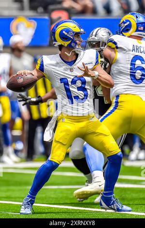 Inglewood, California, USA. August 11, 2024 Inglewood, CA.Los Angeles Rams quarterback Stetson Bennett #13 in action during the NFL Preseason football game against the Dallas Cowboys.Mandatory Photo Credit: Louis Lopez/Cal Sport Media Credit: Cal Sport Media/Alamy Live News Stock Photo