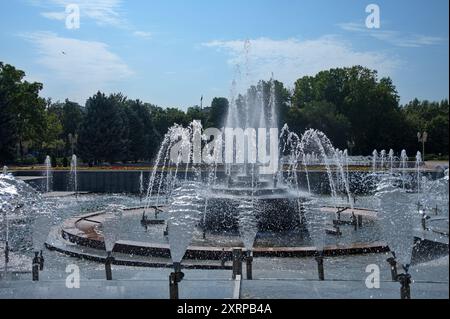 Spray fountain in th center of the city Stock Photo