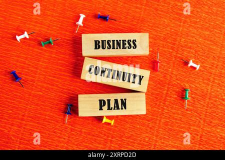 BCP Business continuity plan WRITTEN the inscription on the blocks on an orange background Stock Photo
