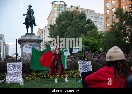 Amad Mahbub, a Bangladeshi artist is giving a speech while the Bangladeshi community is holding a candlelight vigil on August 11, 2024, in McPherson Square, Washington DC, USA, to pay tribute to the martyred students, who are dying in the quota movement in Bangladesh. After mass killings by the law enforcement agency, the quota movement turned into an anti-government protest that led to an uprising that ended the 15-year authoritarian rule of Sheikh Hasina. Nobel laureate Muhammad Yunus and his newly named interim government set out on August 9th. Credit: Aashish Kiphayet/Alamy Live News Stock Photo