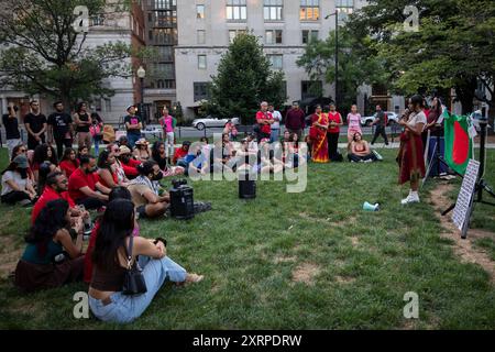 Amad Mahbub, a Bangladeshi artist is giving a speech while the Bangladeshi community is holding a candlelight vigil on August 11, 2024, in McPherson Square, Washington DC, USA, to pay tribute to the martyred students, who are dying in the quota movement in Bangladesh. After mass killings by the law enforcement agency, the quota movement turned into an anti-government protest that led to an uprising that ended the 15-year authoritarian rule of Sheikh Hasina. Nobel laureate Muhammad Yunus and his newly named interim government set out on August 9th. Credit: Aashish Kiphayet/Alamy Live News Stock Photo