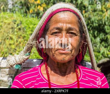 Portrait of an old woman in a mountain village near Pokhara, Nepal Stock Photo