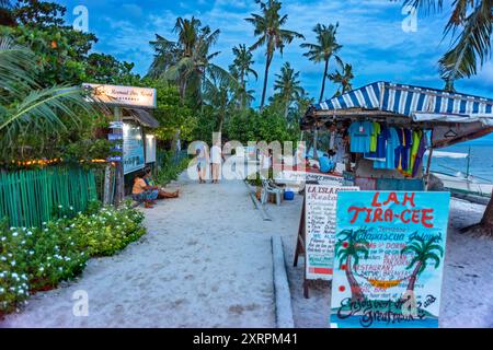 Hotels restaurants and shops in Bounty beach, Malapascua island, Cebu, Philippines  Bounty beach Malapascua Island Cebu Philippines Visayan Sea sun su Stock Photo