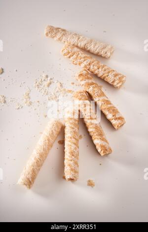Crispy and delicious coconut crispy egg roll snack close up on white background Stock Photo