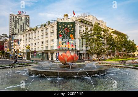 Nguyen Hue Music Fountain and Rex Hotel, Saigon - Ho Chi Minh City, Vietnam Stock Photo