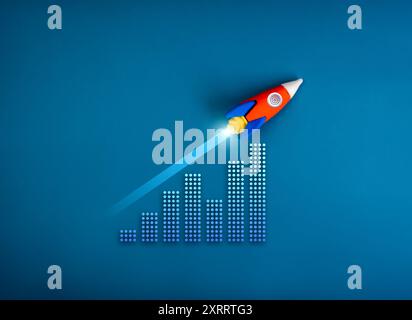 Business growth, leadership, digital marketing, innovation industrial technology, goal and success concept. Rocket toy flying up as rising arrow on gr Stock Photo