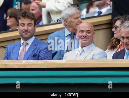 Andre Agassi and his friend Justin Gimelstob watching the action at the 2024 Wimbledon Championships, London,England. Stock Photo