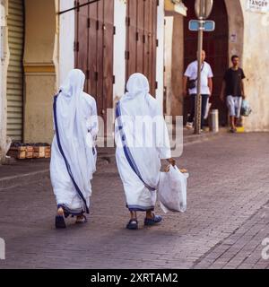 Couple of Missionaries of Charity Sisters walking inside the Medina at Tangier, Morocco. Stock Photo