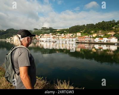 Cool middle aged man hiking and contemplating view in Northern Spain Stock Photo
