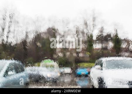 Looking out through a car window obscured by rain. Stock Photo