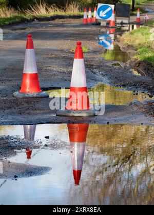 Warning Traffic Sign On Flooded Road With Cars Stock Photo - Alamy