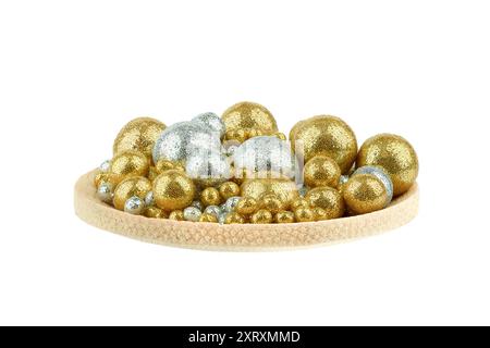 Close up of wooden plate with rice balls topping for dessert decoration. Copy space. Stock Photo